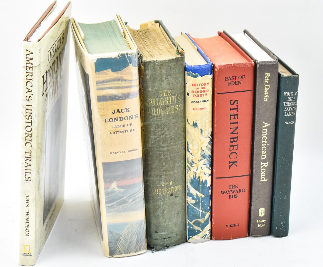 ASSORTMENT OF BOOKS RELATED TO AMERICAN HISTORY & EXPANSION: An assortment of seven books related to the topic of American history and expansion including "Whitman's Ride Through Savage Lands" by O. W. Nixon circa 1905, "American Road" by Pete Davies, First Edi