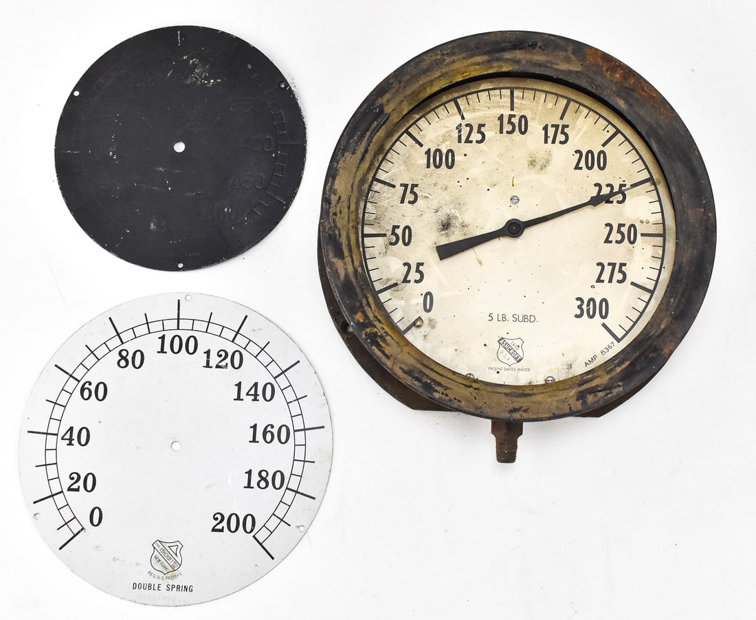 ASHCROFT 5 LB. PRESSURE GAUGE AND 2 PRESSURE GAUGE FACE PLATES: A vintage Ashcroft 5 lb. pressure gauge as well as two additional pressure gauge face plates, one by Ashcroft and one by Ashton. The pressure gauge measures 10.5" H x 10" W x 3" D.