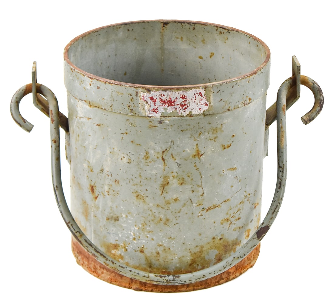 GALVANIZED STEEL BUCKET FROM SCIENTIFIC LABORATORY: A vintage galvanized steel bucket with a partially readable sticker on the side indicating it came from a scientific testing laboratory. The bucket measures 11" H x 15.5" W x 10.5" D.