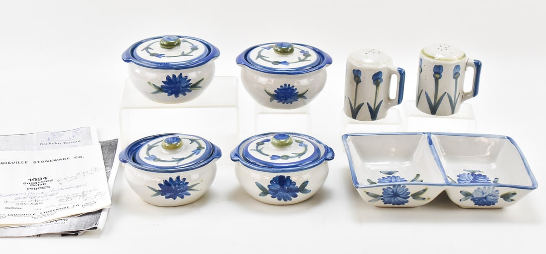 LOUISVILLE STONEWARE SALT & PEPER SHAKERS, LIDED BOWLS & DIP TRAY: Lot includes: four bowls with lids, salt and pepper shakers, and a dip tray all in the Louisville "Bachelor Button Blue" pattern. All pieces were manufactured in 1994 Dip tray measures 6.25" H x 9" W