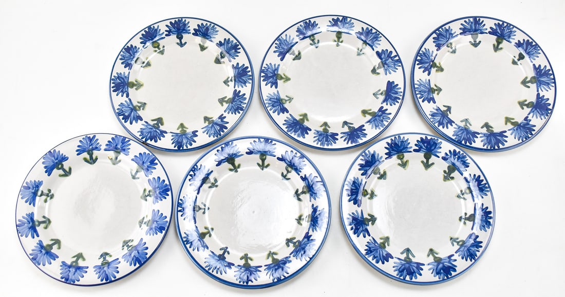 SIX LOUISVILLE STONEWARE PLATES: All plates are in the Louisville "Bachelor Button Blue" pattern. All pieces were manufactured in 1994. Each plate has a measurement of 11" H x 11" W x 1" D.