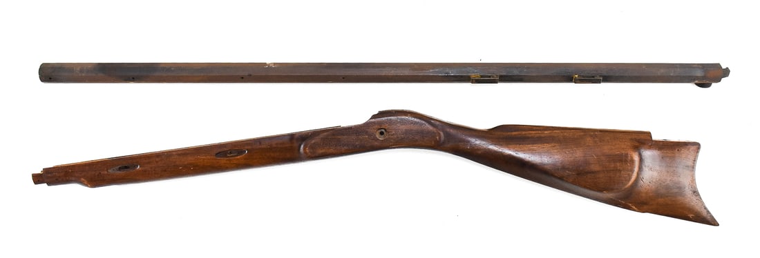 LYMAN GREAT PLAINS .54 CAL. CAP-LOCK RIFLE BARREL & STOCK: A Lyman Great Plains .54 cal. muzzle-loading and cap-lock rifle barrel made in Italy, and the accompanying stock. The barrel measures 33" L, and for shipping dimensions measures 1" H x 33" W x 1" D.