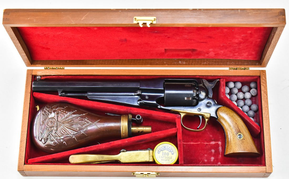EUROARMS BRESCIA ITALY .44 REM 'NEW MODEL ARMY': A Euroarms Brescia Italy .44 caliber Remington replica or commonly known as the "New Model Army, circa early 1970s.This black powder cap and ball revolver comes complete with a storage box with