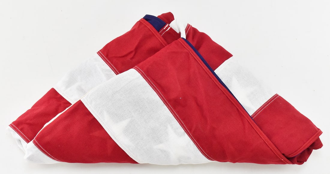 AMERICAN FLAG, 100% COTTON: A large all weather 100% cotton American Flag, made in the USA. The flag measures 57" H x 110" W.