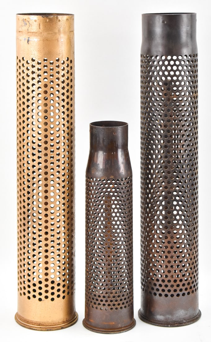 RECOILLESS RIFLE SHELLS: A set of three recoilless rifle shells including an 105mm M32 recoilless rifle shell for use in the M27 Recoilless Rifle, a 106mm recoilless shell for use in the M40 recoilless rifle circa 1950s, and