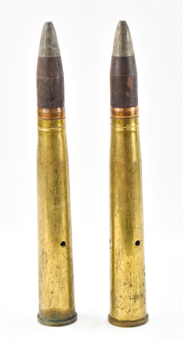 40MM MK3 & MK5 DUMMY ROUNDS: A pair of 40mm dummy rounds, MK3 & MK5. Each round measures 17.5" H x 2.5" W x 2.5" D.