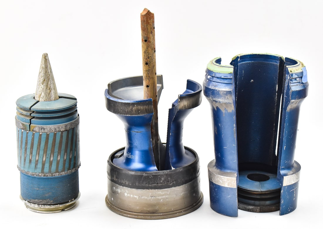 SABOT ROUND COLLECTION: A collection including a 105 mm tank sabot projectile with pedals, a 120mm M865 shell with sabot pedals, a set of 120 mm projectile sabot pedals, and a set of 105 mm projectile sabot pedals. The