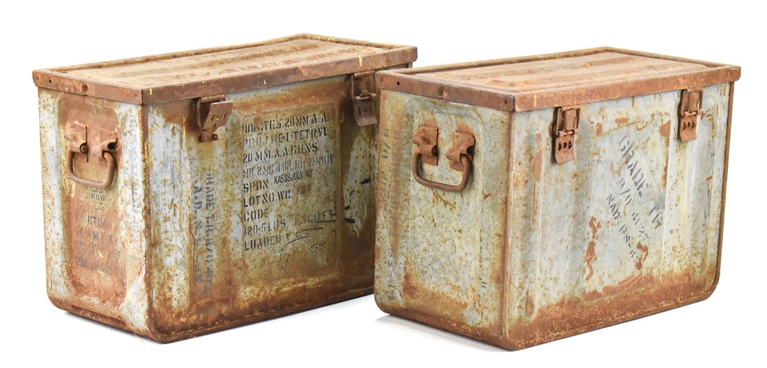 PAIR OF WWII 20MM ANTI-AIRCRAFT AMMO CANS: A pair of WWII 20 mm anti-aircraft ammo cans, made in 1943. The cans have the original military markings on the sides of the can. Each can measures 13" H x 18" W X 9" D.