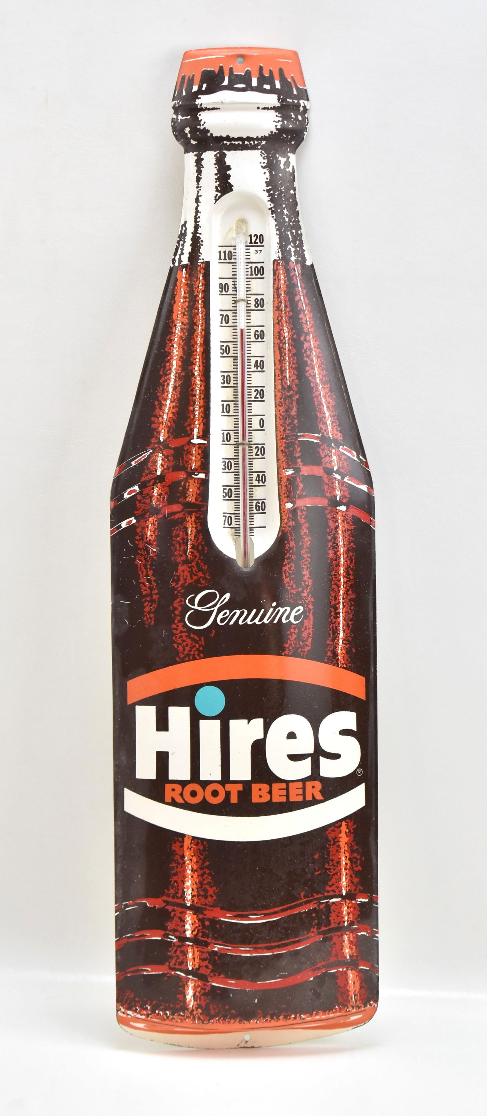 HIRES ROOT BEER ADVERTISING THERMOMETER: Die cut metal body with a glass thermometer incased. Manufactured circa 1950s with measurements of 29" H x 8" W x 1" D.