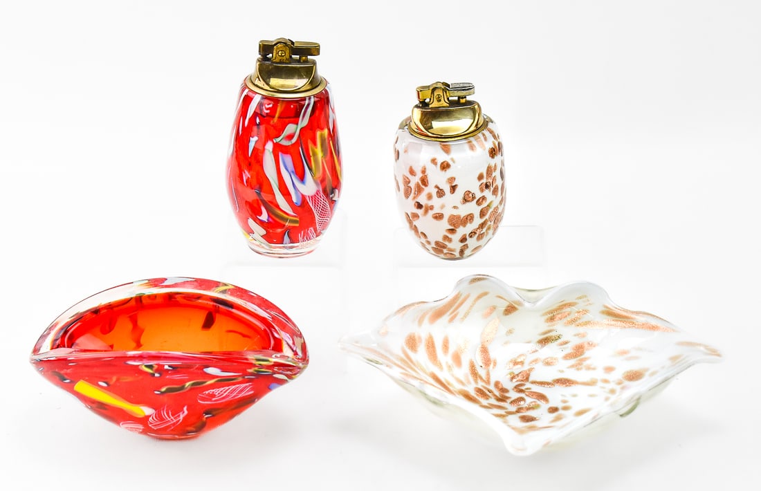 TWO PAIRS OF MURANO TABLE LIGHTERS & MATCHING ASHTRAYS: Two pairs of Murano glass table lighters and matching glass ashtrays including a pair made of white cased glass with copper aventurine and a pair made of red multi-colored confetti glass. The white av