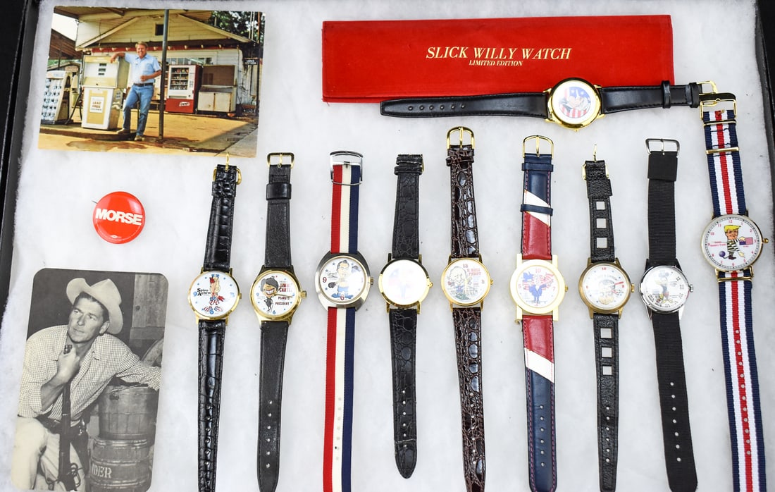 MECHANICAL POLITICAL WRISTWATCHES, EPHEMERA, & MORE: This lot includes Western Art Post Card Company "Ronald Regan" postcard, Noble and Plant Company "Billy Carter..." postcard, Wayne Morse pin-back button, and ten political caricature mechanical wristw