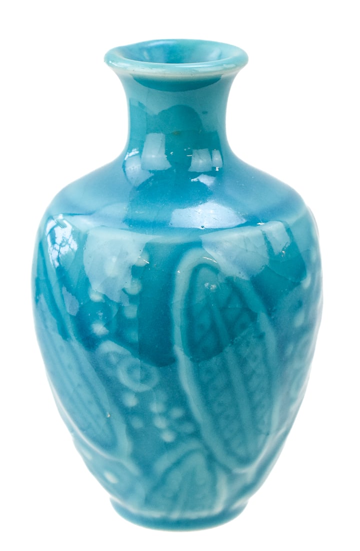 ROOKWOOD BLUE LEAF AND BERRIES PATTERN BUD VASE NO. 6444: A Rookwood marked blue leaf and berries pattern bud vase No. 6444, circa 1945. The item measures 5.5" H, 3" W, 3" D.
