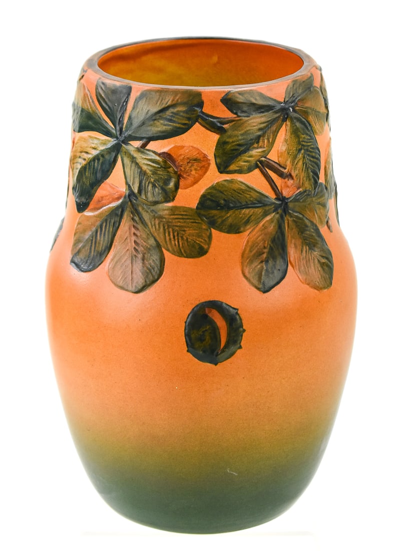 PETER IPSEN ENKE DANISH FOLIATE VASE: A Peter Ipsen Enke - Denmark marked vase in foliate relief pattern No. 791, circa early 20th century. The item measures 9.5" H, 5.5" W, 5.5" D.