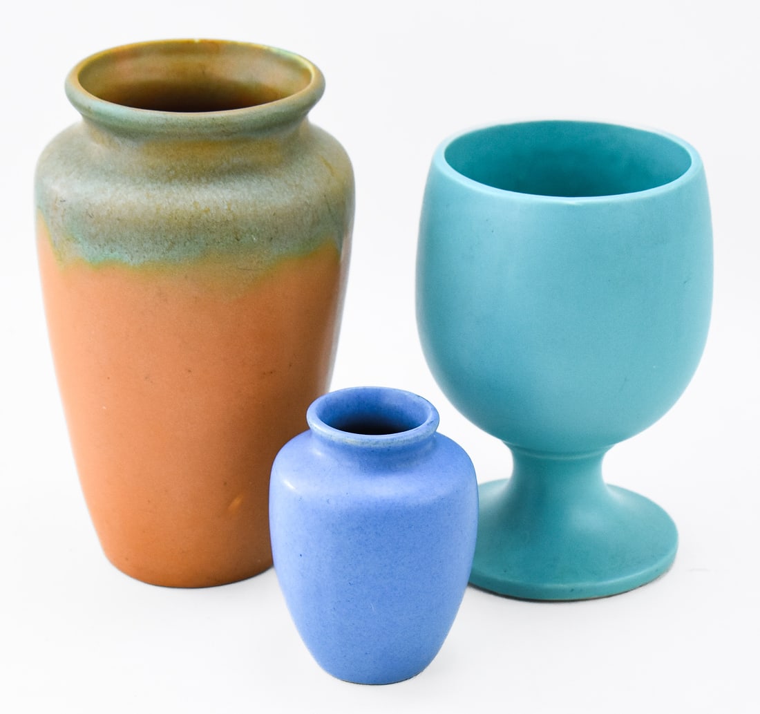 20TH CENTURY POTTERY: MCCOY, MUNCIE STYLE, & MORE: This lot includes the following ceramics: unmarked matte blue vase circa early 20th century, McCoy "Silhouette Line" matte turquoise goblet vase circa 1960s, and a Muncie style turquoise and orange dr