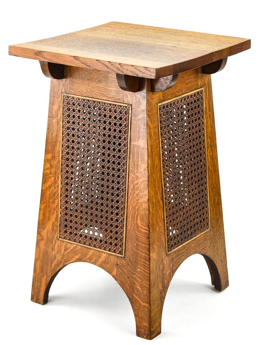 MISSION OAK AND CANE ACCENT TABLE: A Mission oak accent table with caned panels, circa early 20th century. The table is stamped #420 underneath and measures 22" H x 14" W x 14" D.