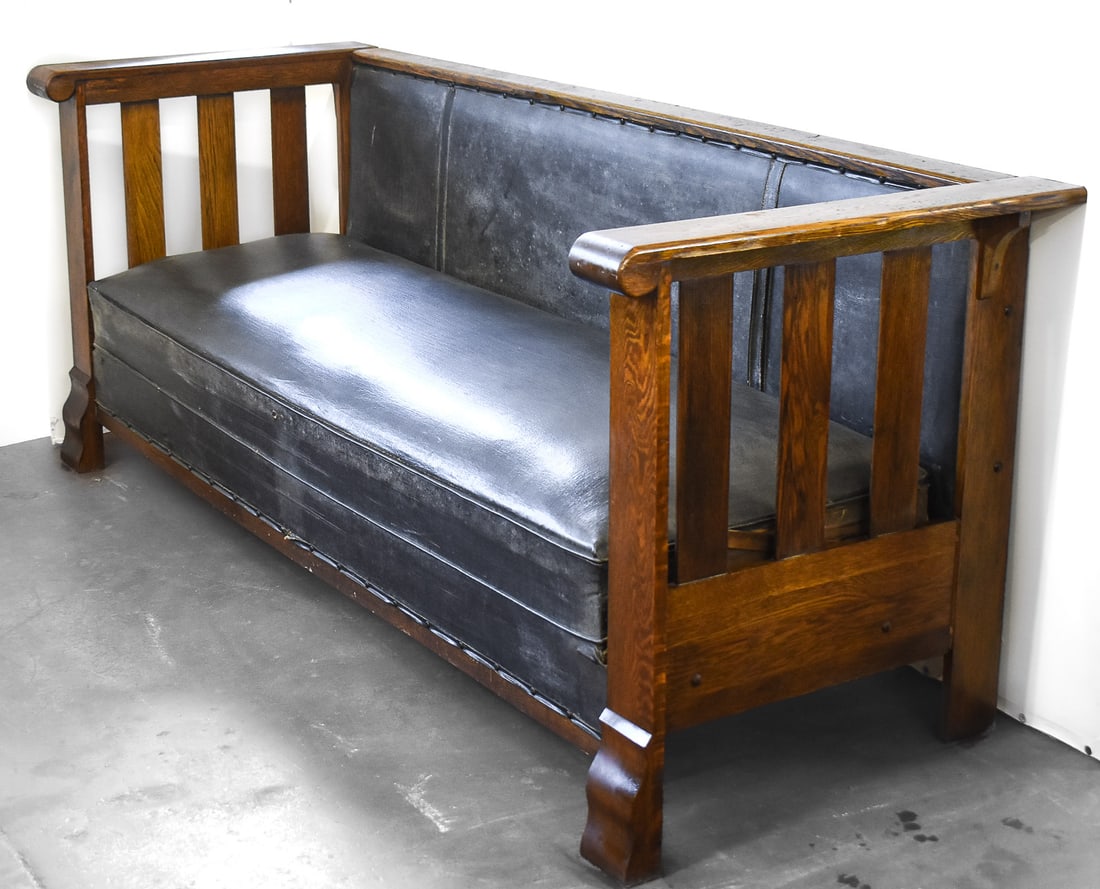 KROEHLER (ATTR.) MISSION STYLE OAK 'DAVENPORT' SOFA: A Kroehler Manufacturing Company (attributed) Mission style oak 'Davenport' unifold sofa, circa early 20th century. The item measures 32.5" H, 81.5" W, 29" D.