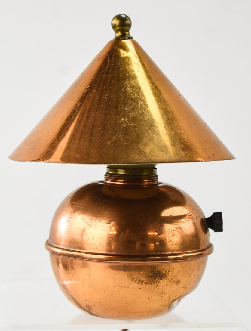 MODERNIST COPPER GLOW LAMP BY RUTH GERTH FOR CHASE: A Modernist copper glow lamp designed by Ruth Gerth for Chase, circa 1930s. The lamp measures 7" H x 5.5" H x 5.5" D.