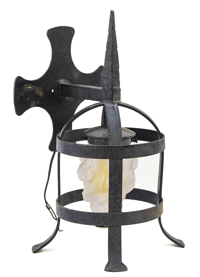 CAST IRON WALL SCONCE, FORGEKRAFT INC., MID-20TH CENTURY: A cast iron wall sconce model number C-205/021 made by ForgeKraft Incorporated of Fontana, California, circa mid-20th century. The wall sconce has a French Gothic torch design with an Art Deco frosted