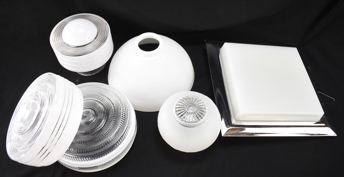 SIX MID-CENTURY MILK GLASS SHADES: This lot includes six Mid-century milk glass shades. The largest measures 12.5" H x 12.5" W x 2" D.