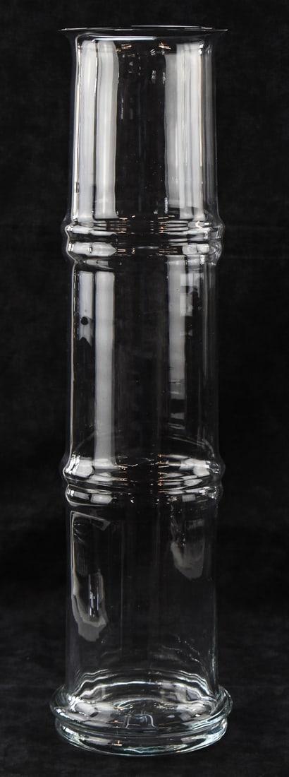 MID-CENTURY TALL BLENKO GLASS CLEAR 'BAMBOO' FLOOR VASE: A Mid-century extra tall Blenko Glass No. 7820 clear "bamboo" floor vase designed by Don Shepard in 1978. The item measures 24.5" H x 6" W x 6" D.