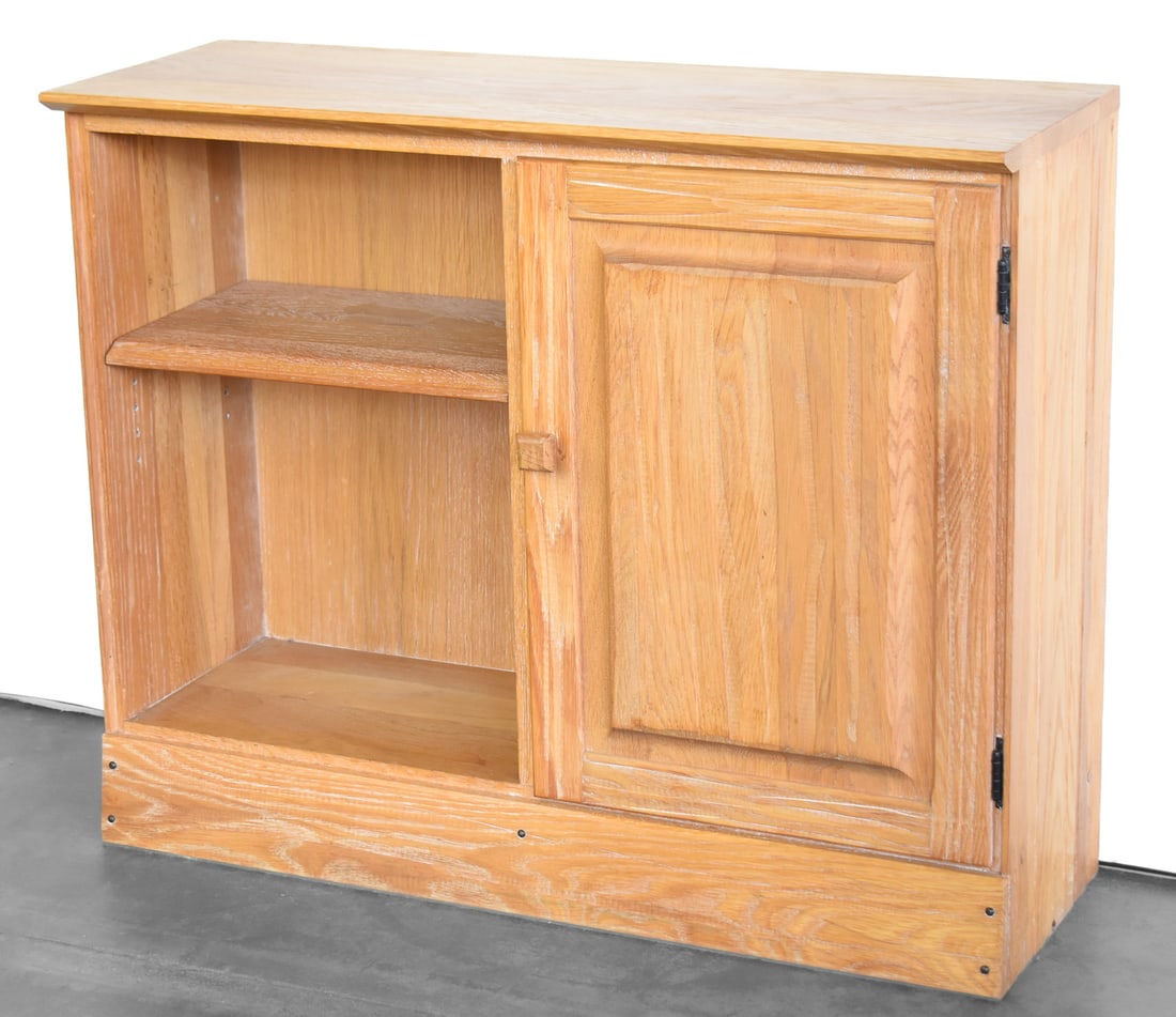 BRANDT RANCH OAK SMALL BOOKCASE WITH CABINET: A Brandt Ranch Oak small bookcase with a cabinet measuring 29" H x 35.5" W x 13" D.