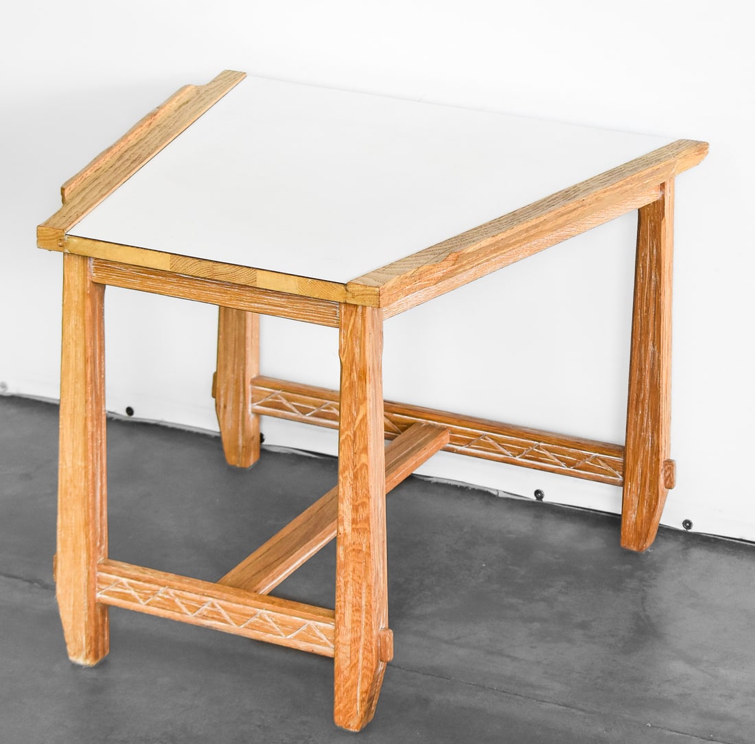 BRANDT RANCH OAK CHILD'S TABLE: A Brandt Ranch oak child's table with a white laminate top measuring 20.5" H x 26" W x 26" D.