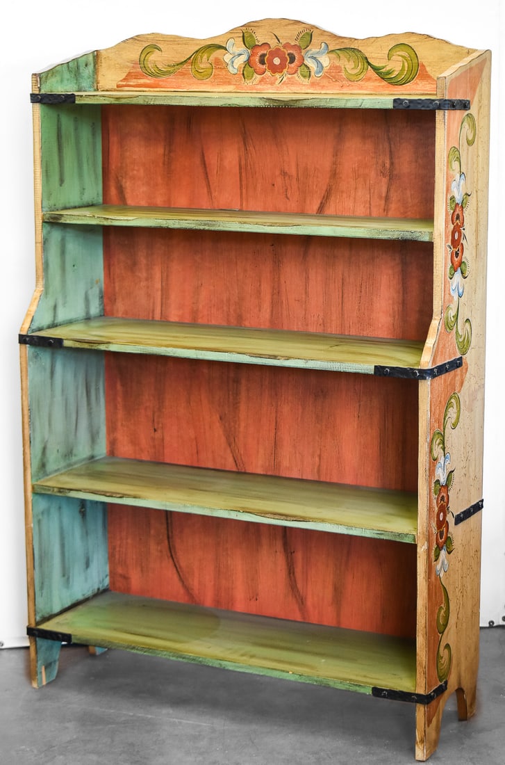 MONTEREY STYLE HAND-PAINTED BOOKCASE: A Monterey style green bookcase with a hand-painted floral design, circa 1930-1940s. The item measures 55" H x 36" W x 13" D.