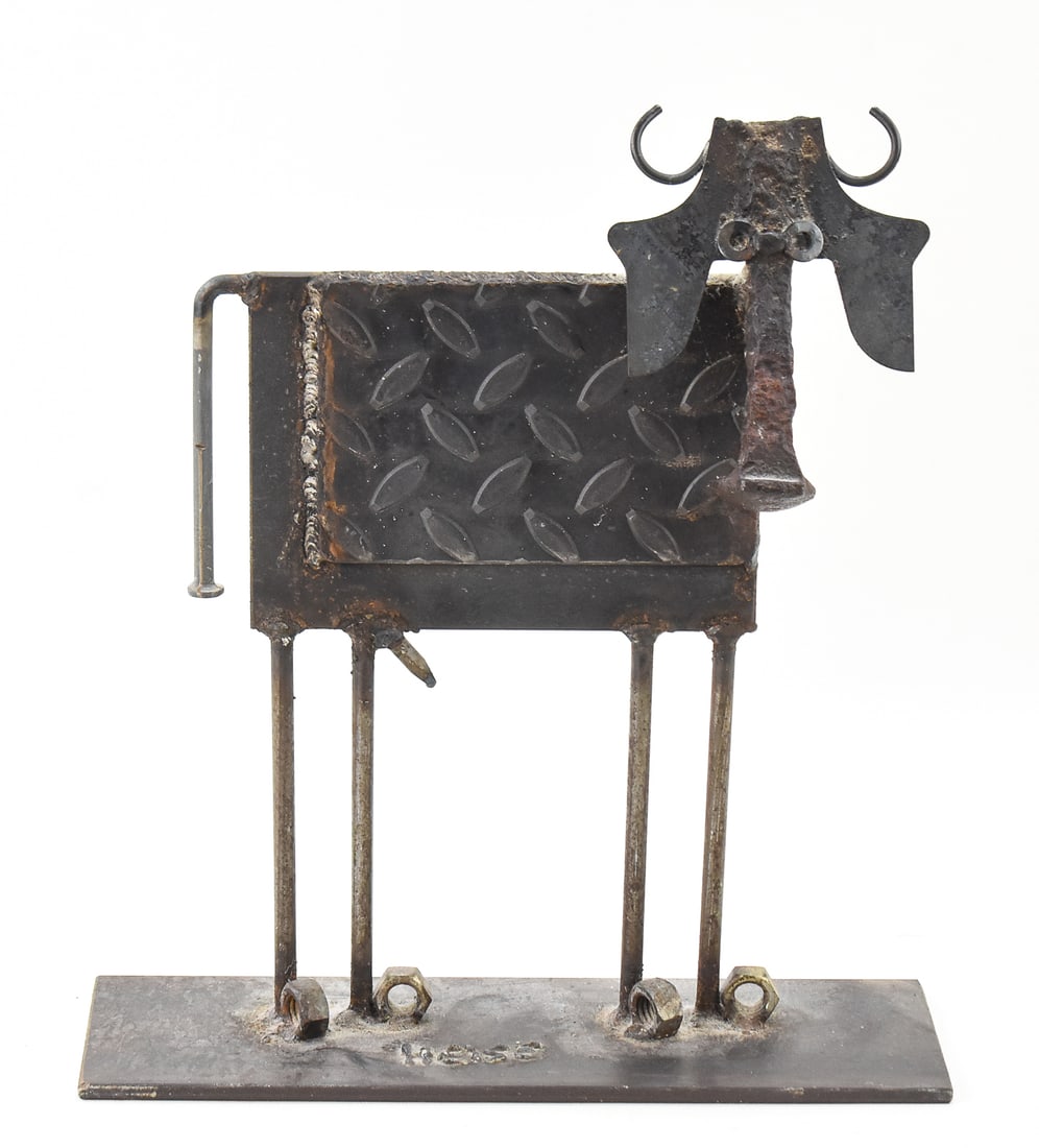 BILL HEISE (LISTED ARTIST) SIGNED FOLK ART IRON BULL SCULPTURE: A Bill Heise (listed American artist) signed folk art welded iron bull sculpture, circa late 20th century. The item measures 13.5" H, 12" W, 4" D.
