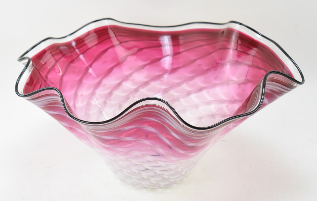 LACHAUSEE ART GLASS CENTERPIECE BOWL: A large art glass centerpiece bowl with a red and white optic swirl pattern and a ruffled rim made by LaChausee Blown Glass in 2008. The bowl has an etched signature "LaChausee" on the base and has
