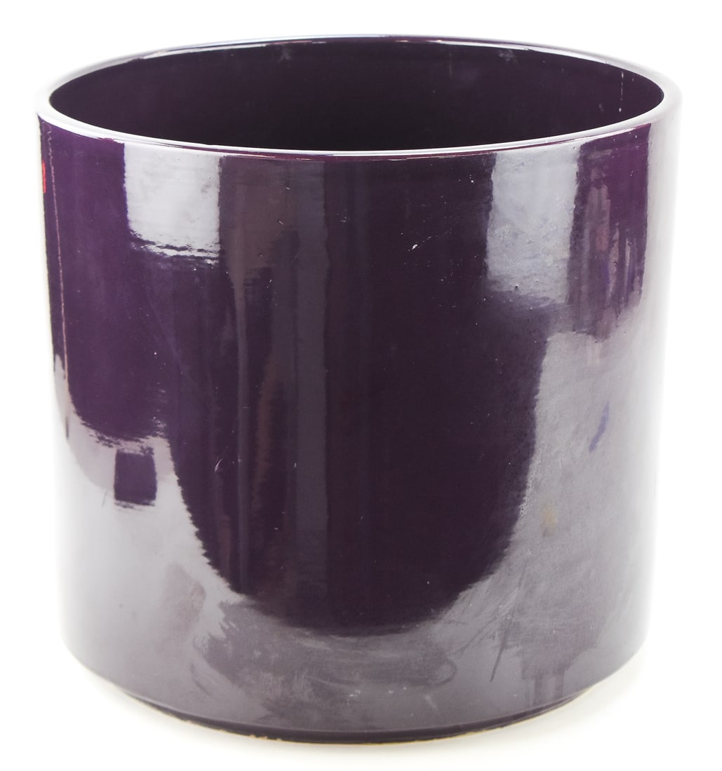 GAINEY CERAMICS AC14 PURPLE PLANTER: A Gainey Ceramics of California AC14 planter in glazed purple measuring 14" H x 15" W x 15" D.