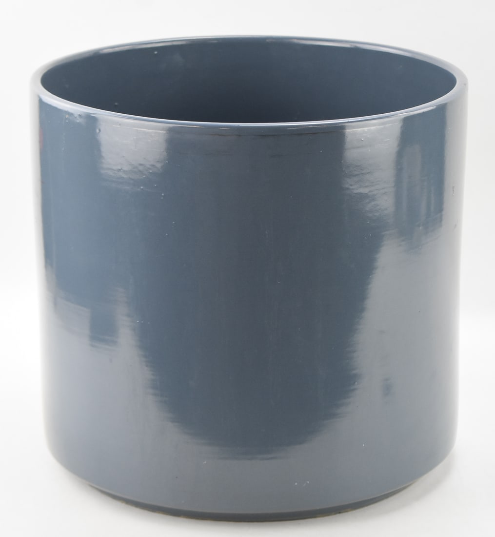 GAINEY CERAMICS AC14 PERIWINKLE PLANTER: A Gainey Ceramics of California AC14 planter in glazed periwinkle measuring 14" H x 14.5" W x 14.5" D.