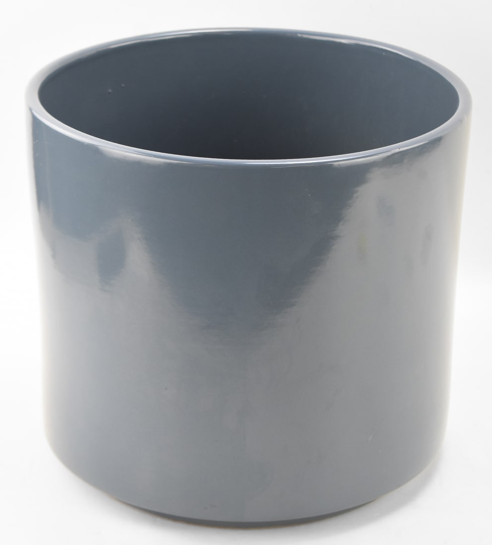 GAINEY CERAMICS AC12 PERIWINKLE PLANTER: A Gainey Ceramics of California AC14 planter in glazed periwinkle measuring 12" H x 12.5" W x 12.5" D.