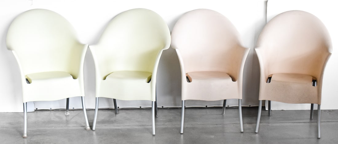 SET OF FOUR POSTMODERN PHILIPPE STARCK 'LORD YO' STACKING CHAIRS: A set of four Philippe Starck "Lord Yo" stacking stacking plastic and cast aluminum chairs for indoor or outdoor use, circa 1980s. The chairs measure 37" H x 24.5" W x 24" D.