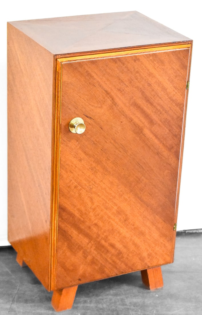 MAHOGANY VENEER BEDSIDE CABINET: A mahogany veneer over pine bedside cabinet with inner shelf measuring 27.5" H x 14.5" W x 11.5" D.