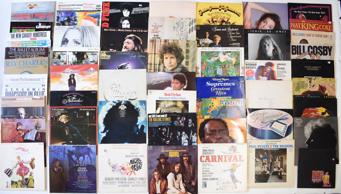 ASSORTED VINTAGE LP RECORDS OF MIXED GENRES: This lot includes approximately 50 vintage LPs of mixed genres. The items measure 12" H x 12" W x .05" D.