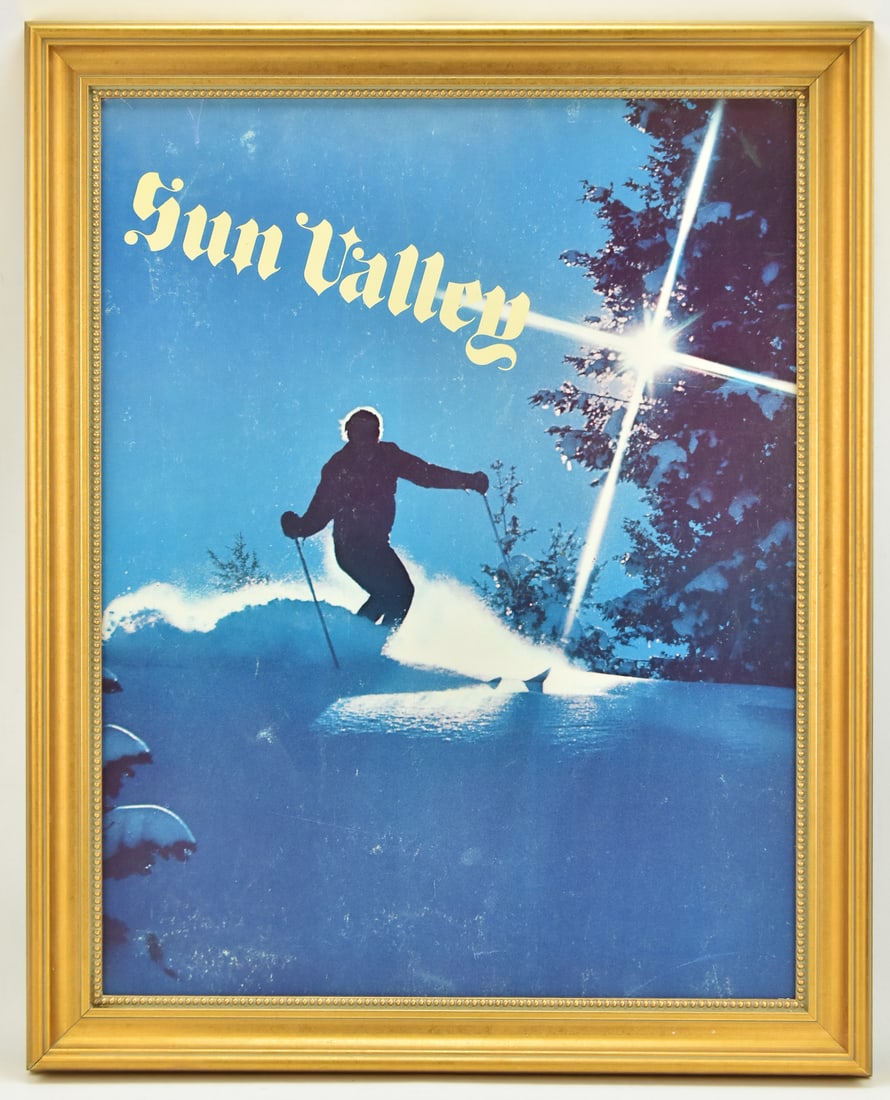 SUN VALLEY SKIING VINTAGE TRAVEL POSTER: Vintage skiing travel poster promoting Sun Valley, Idaho. Art measures 29" H x 22" W presented in a frame measuring 34" H x 27" W x 2" D.