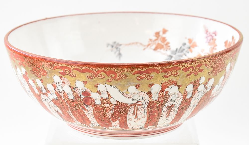 JAPANESE KUTANI 'THOUSAND SCHOLAR'S' FAMILLE ROSE BOWL: A Japanese Kutani marked bowl with 'Thousand Scholars' motif and famille rose interior, circa early-mid Meiji era. The item measures 4" H, 9.5" W, 9.5" D.