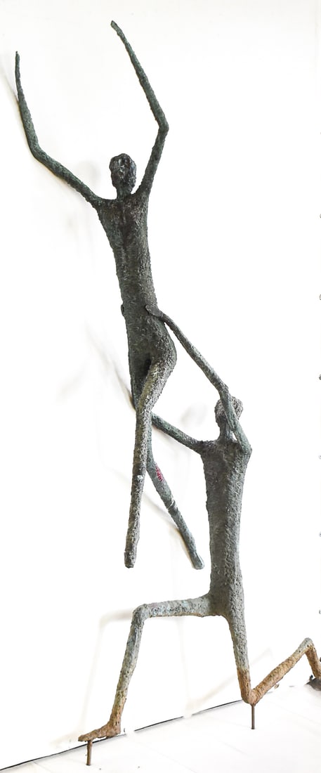 BRUTALIST STYLE SCULPTURE OF RUNNERS: A Brutalist style sculpture of two runners, circa late 20th century. The item measures 68" H, 14" W, 30" D.