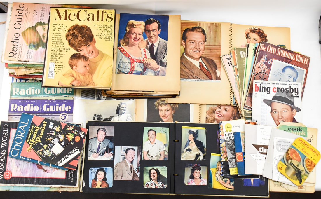 20TH CENTURY EPHEMERA ASSORTMENT: SCRAPBOOKS, RECIPE BOOKS, AND MORE: This lot includes a collection of 20th century ephemera: scrapbooks with press photos and clippings, recipe books, and more. The largest item measures 1" H, 15.5" W, 11.5" D.