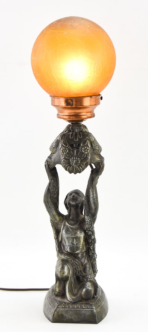 LA BELLE SPECIALTY COMPANY (ATTR.) ART DECO JOAN OF ARC FIGURAL TABLE LAMP: A La Belle Specialty Company (attributed) Art Deco electric spelter figural table lamp of Joan of Arc, circa early 20th century. The item without the glass shade measures 17" H, 4" W, 5.5" D.
