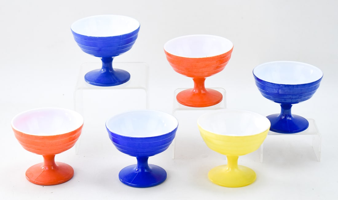 SIX HAZEL ATLAS MODERNTONE PLATONITE TALL SHERBETS: This lot includes six Hazel Atlas Moderntone Platonite tall sherbets, circa mid 20th century. The item measures 3.5" H, 4" W, 4" D.