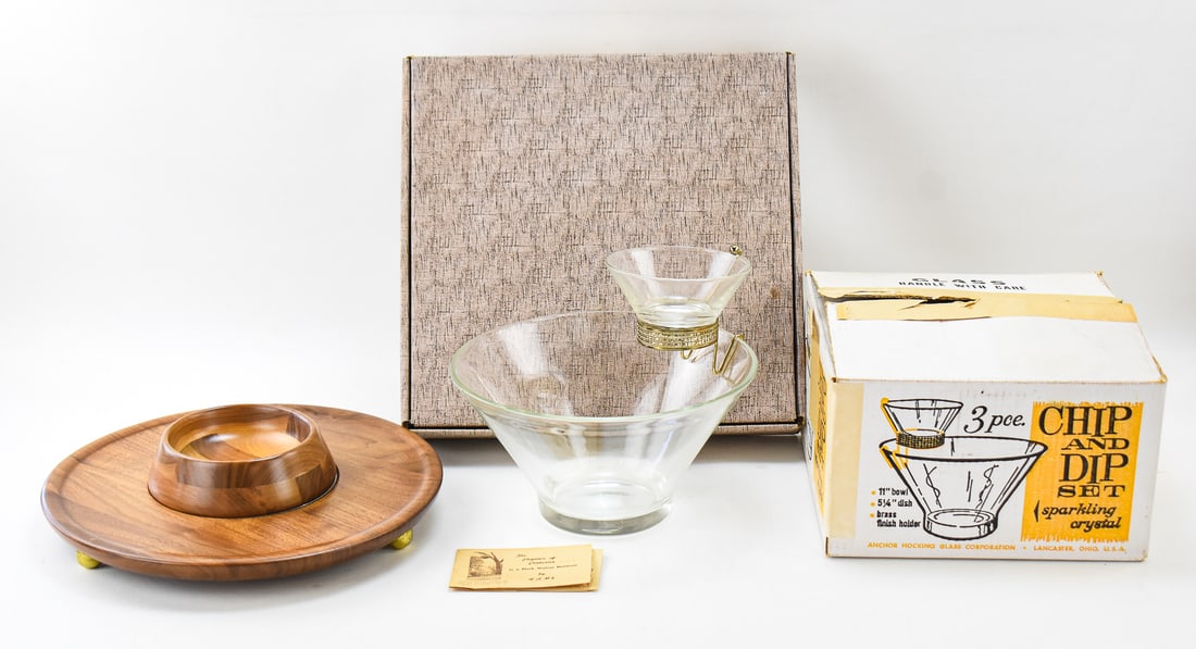 NEW OLD STOCK MID-CENTURY SERVING A DIP MASTER & CHIP-N-DIP: This lot includes a new old stock Mid-century serving dishes which includes a Crystal-Clear Chip-N-Dip with a stand and a Dip Master black walnut two-piece serving tray. The box for the Dip Master
