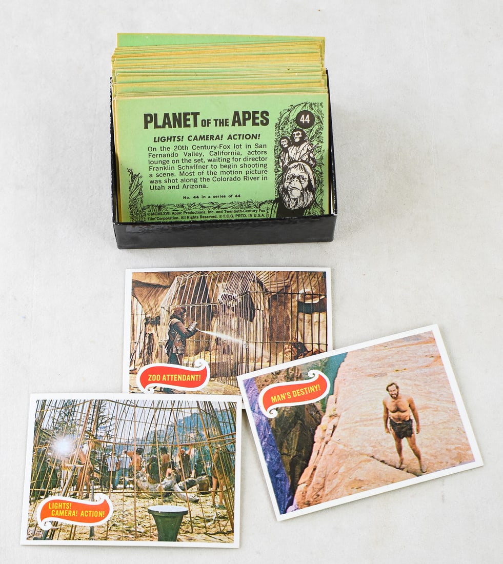 1968 TOPPS PLANET OF THE APES TRADING CARDS, 51 IN TOTAL: A collection of 1968 Topps trading cards for the Planet of the Apes movie with Charlton Heston. These cards are the USA printing. This trading card set had 44 cards in a complete set. This lot include