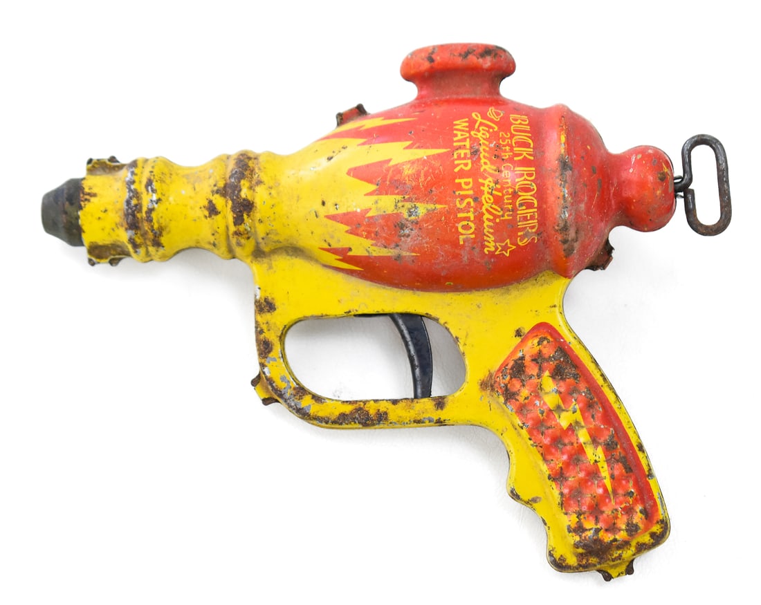 DAISY MANUFACTURING COMPANY 'BUCK ROGERS' TIN LITHO WATER PISTOL: A Daisy Manufacturing Company Buck Rogers liquid helium tin litho water pistol, circa 1930s. The item measures 2" H, 7.5" W, 6" D.