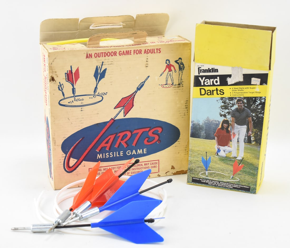 JARTS MISSILE GAME SET C. 1970s & FRANKLIN MODEL 3210 LAWN DARTS SETS: A Jarts Missile Game in the original box with four darts, two extra fins, and two target rings circa 1970s and a Franklin Lawn Darts set model 3210 in the original box with four slider darts and two t