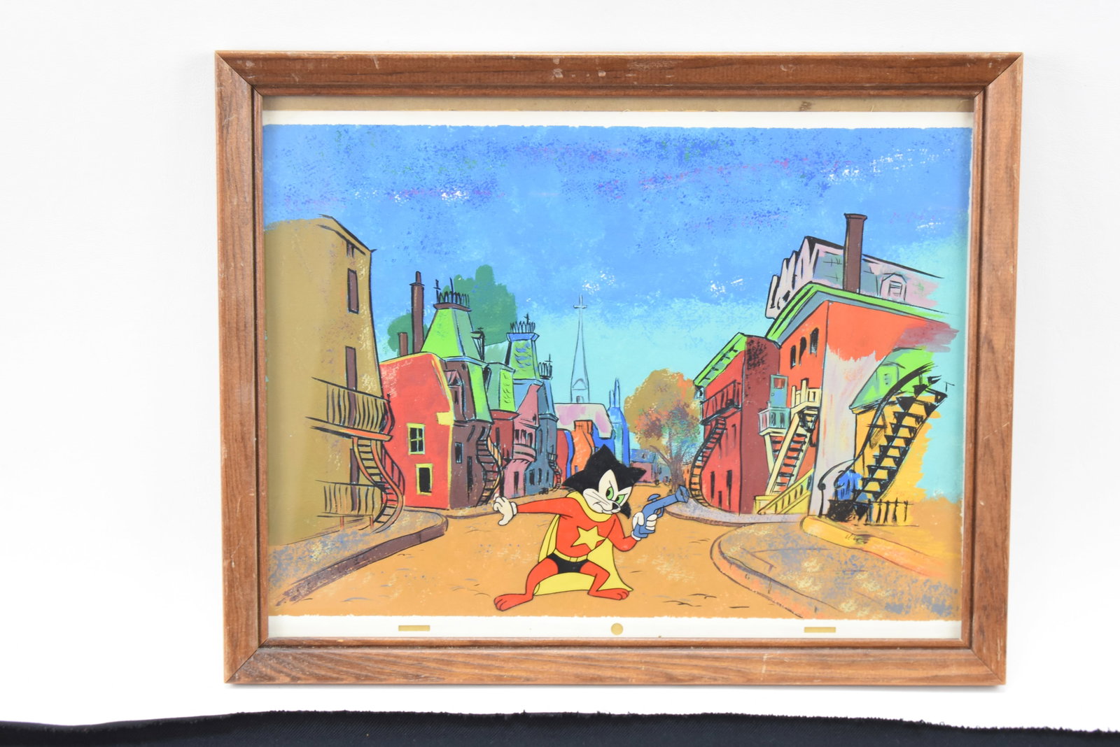 TRANS-ARTISTS PRODUCTIONS COURAGEOUS CAT AND MINUTE MOUSE PRODUCTION CEL: A Trans-Artists Productions framed Courageous Cat and Minute Mouse production cel setup with painted background, circa 1960s. The item measures 12.5" H, 15.5" W, 1" D.