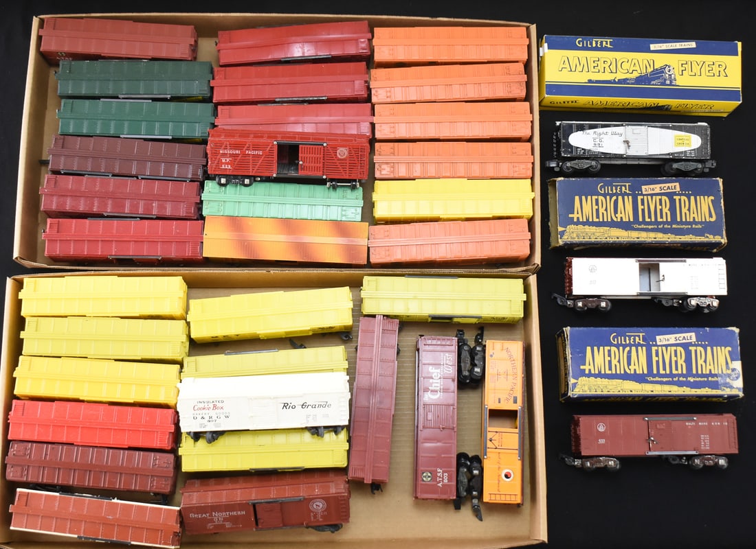 35 BOX CARS FROM AMERICAN FLYERS: All thirty-five box cars are plastic. One of the 639 American Flyers is a reproduction. The 633 B&O in white, in tucson, and the 981 Central of Georgia come with their original boxes. Ten box