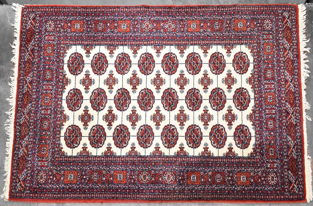 KARASTAN "IVORY BOKHARA" PATTERN WOOL RUG (1 of 2)