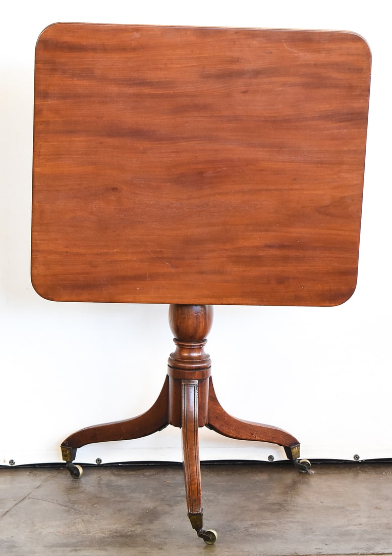 ANTIQUE MAHOGANY FLIP-TOP TEA TABLE ON CASTORS (1 of 3)