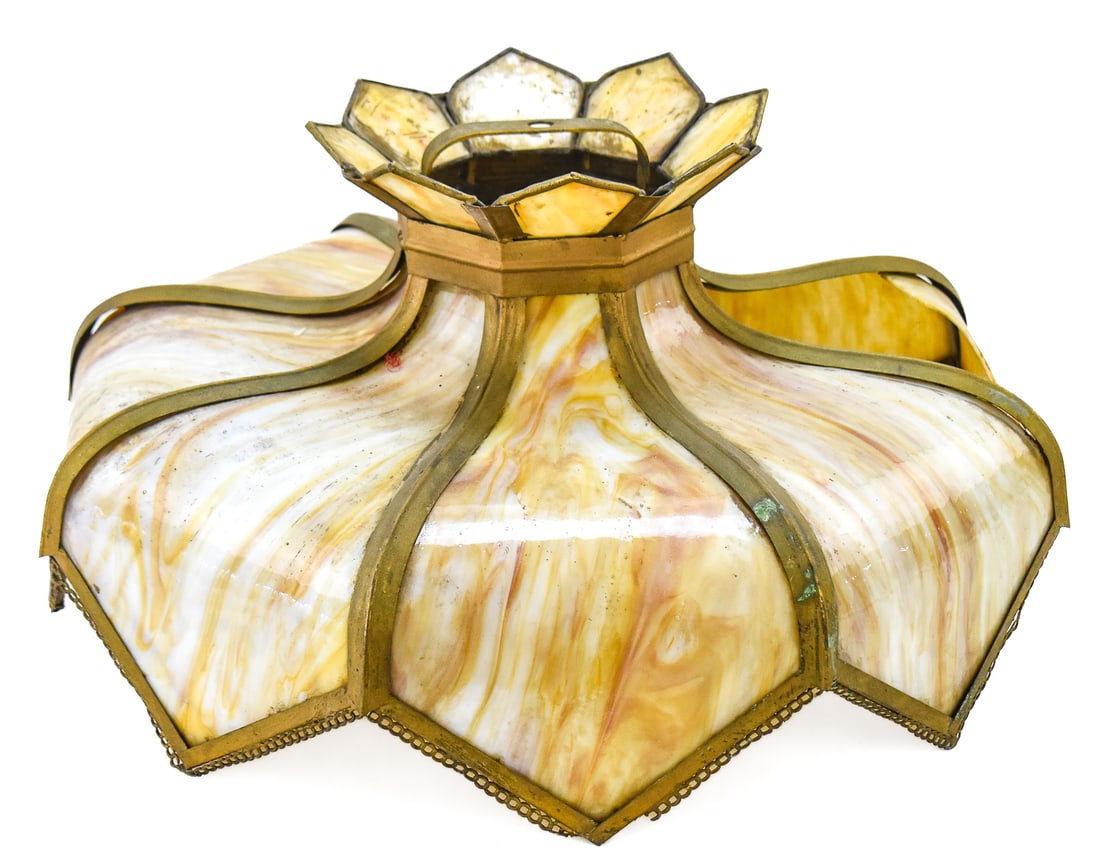 EARLY 20TH CENTURY CARAMEL SLAG GLASS LAMPSHADE: A caramel slag glass lampshade, circa early 20th century. The item measures 12" H, 21" W, 21" D.